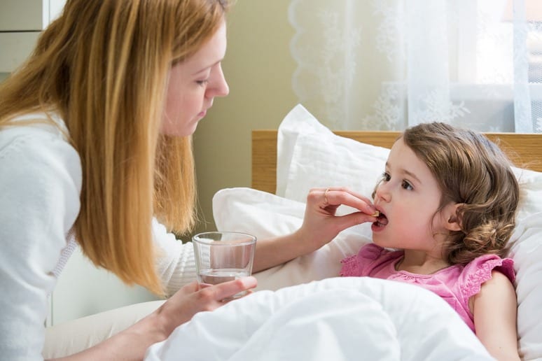 Mother Gives Child Sick in Bed Antibiotics