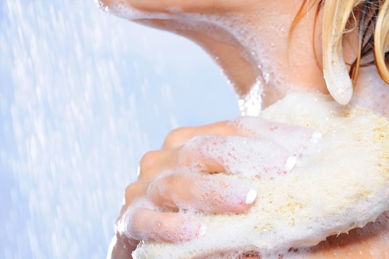 Woman Showers Using DIY Essential Oil Body Wash