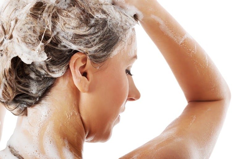 Woman Uses Rosemary Mint Shampoo