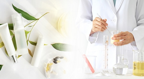 Scientist Mixing Essential Oils